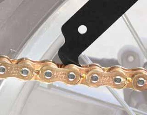 The DRC Chain checker is easy to use - lightly attach it to a chain roller