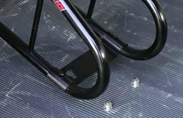 The DRC Wheel Chock fitting kit makes it easy to attach and remove the DRC Moto Binding or Wheel Chock 2 (SAMPLE PICTURE OF THE WHEEL CHOCK)